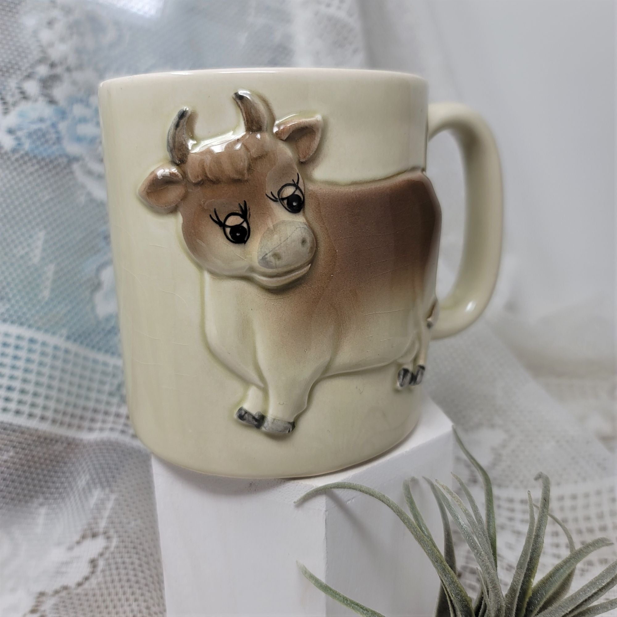 Coffee mug in Embossed cow design, Otagiri 1981