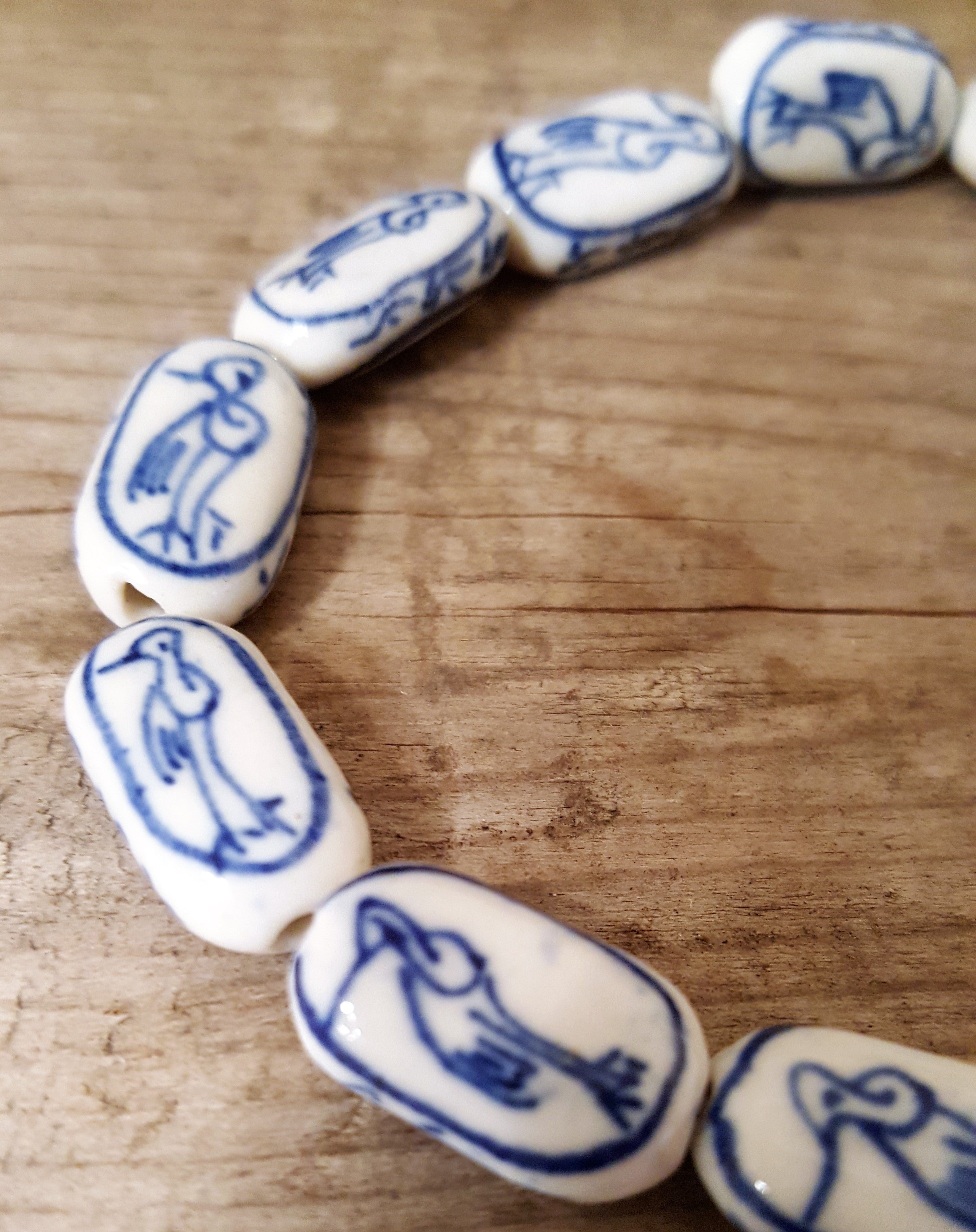 Hand painted navy blue and white beads Porcelain with Asian Loon Bird