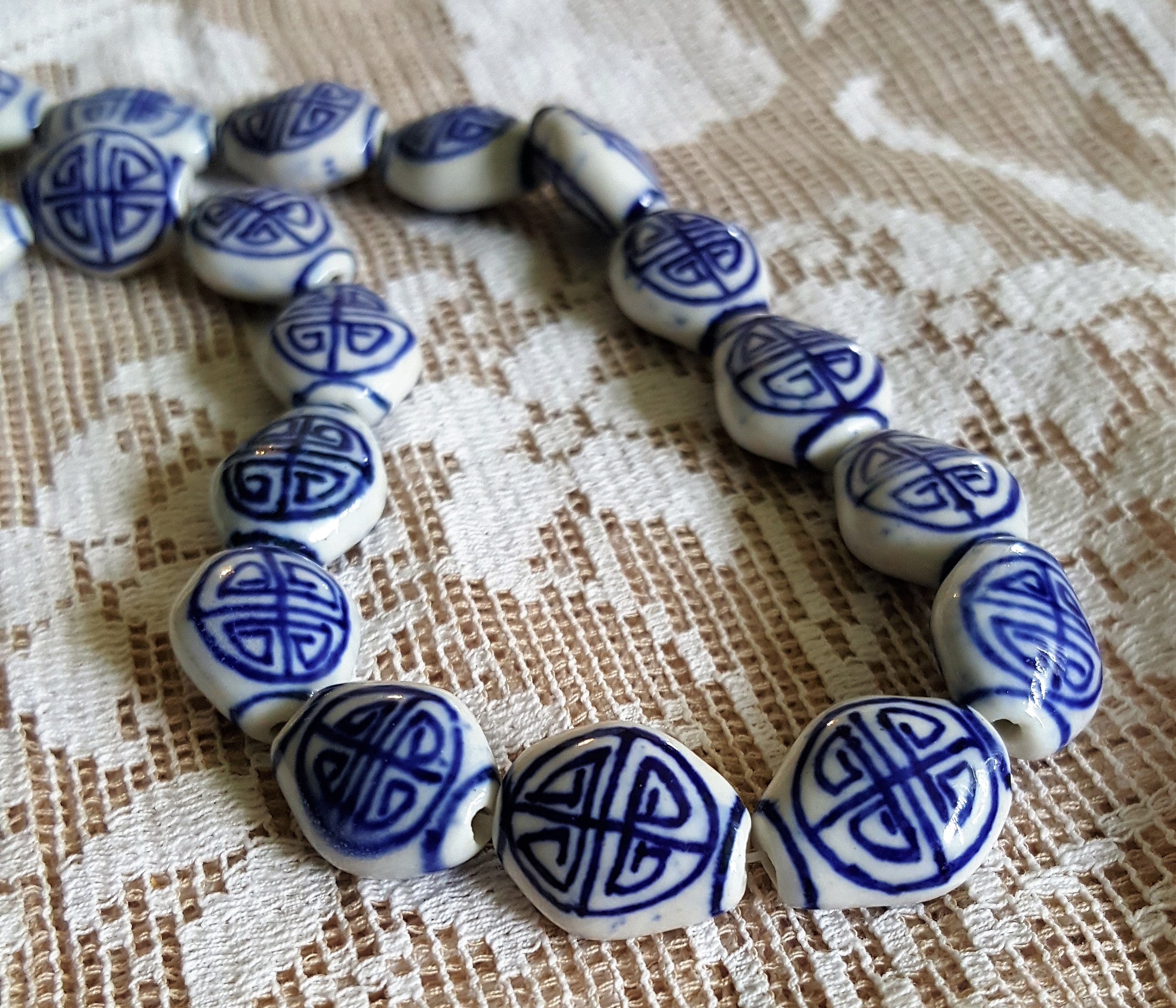 Hand painted navy blue and white beads Porcelain with Asian good luck sign 24 beads Cushion Shape
