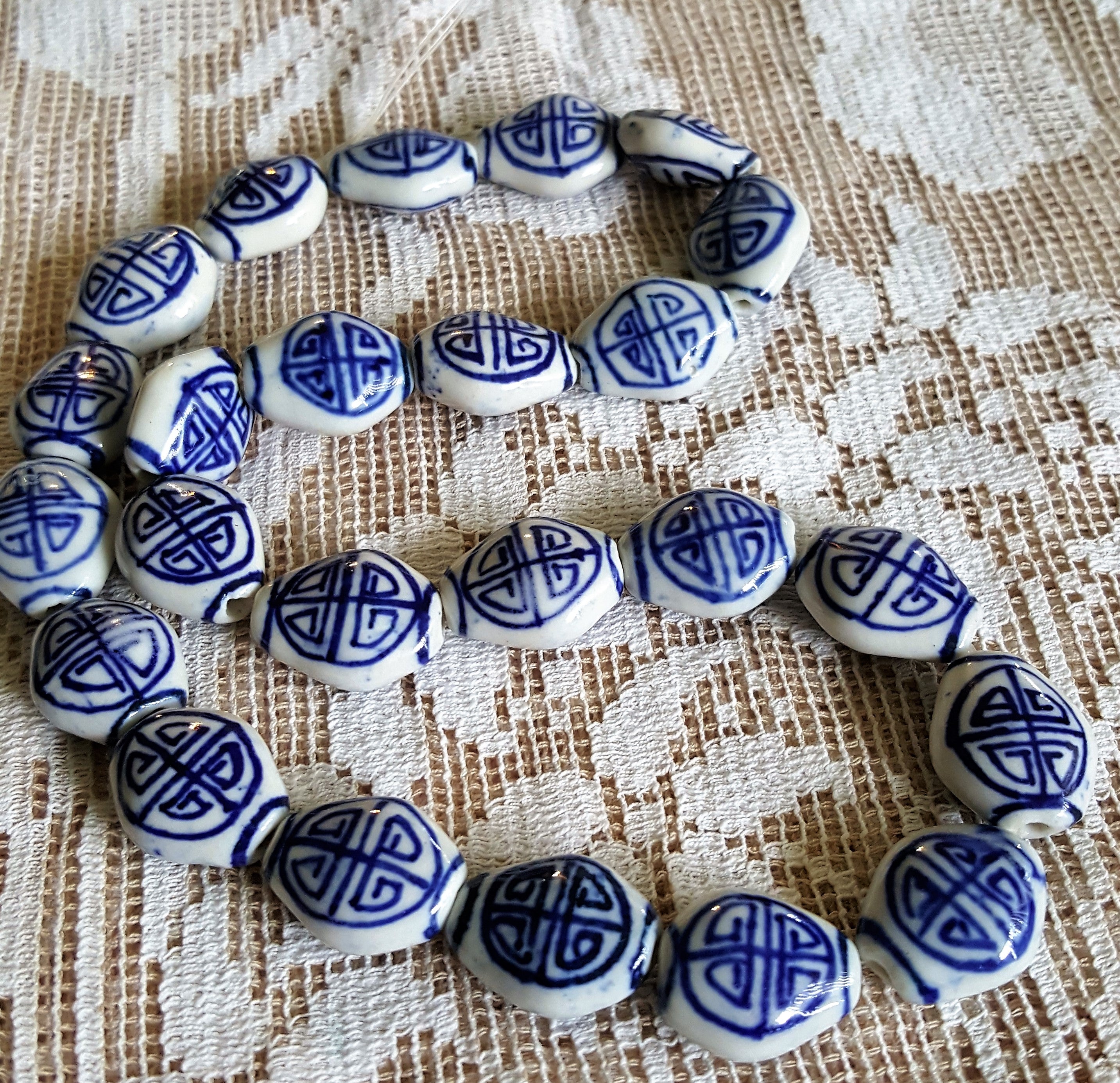 Hand painted navy blue and white beads Porcelain with Asian good luck sign 24 beads Cushion Shape