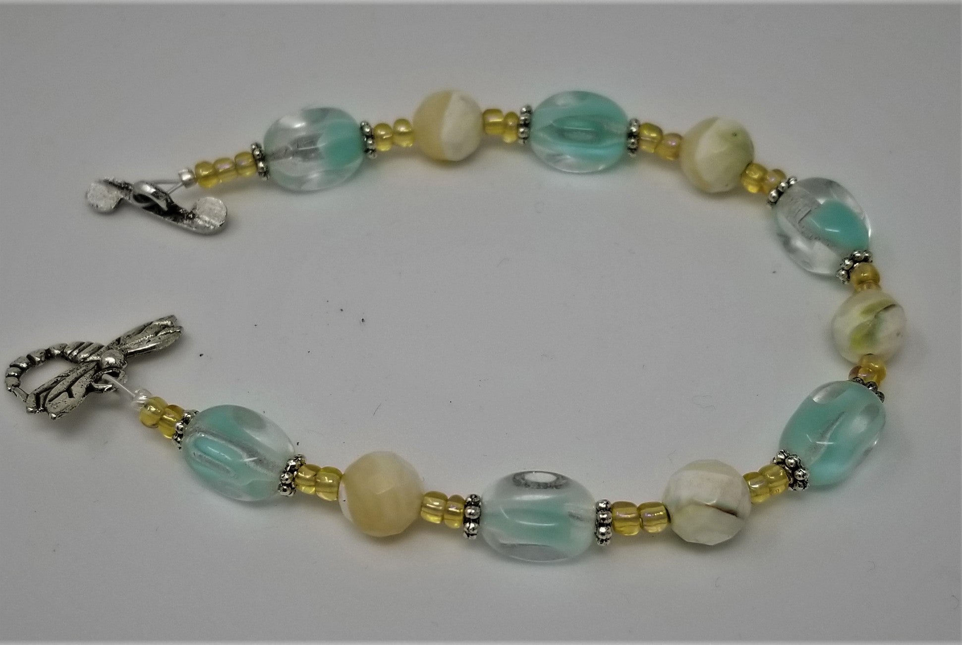 Handmade Beaded bracelet Mother of Pearl and Czech Glass Faceted Aqua Dragon Fly