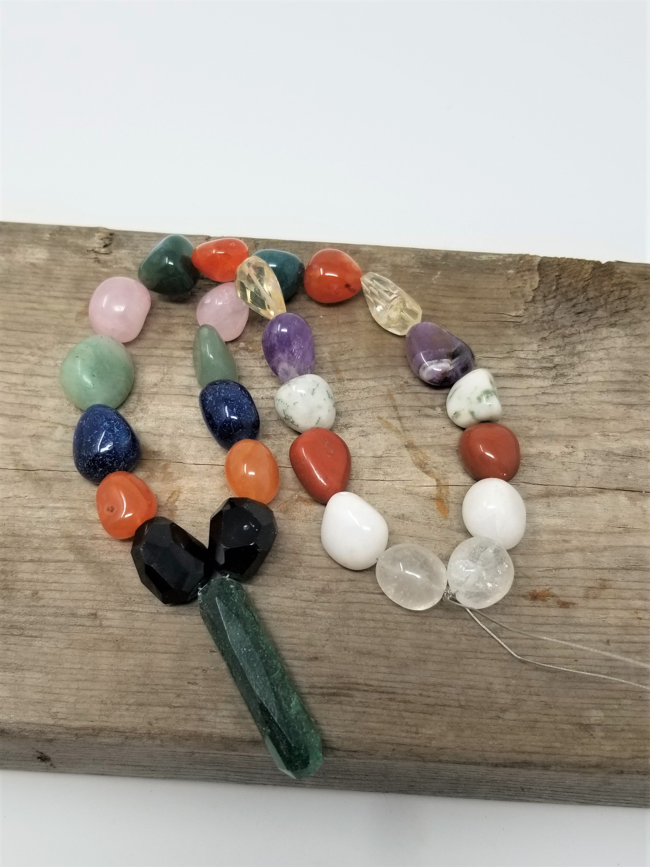 Wonderful Matched Tumble Stone Beads with a Point 27 beads