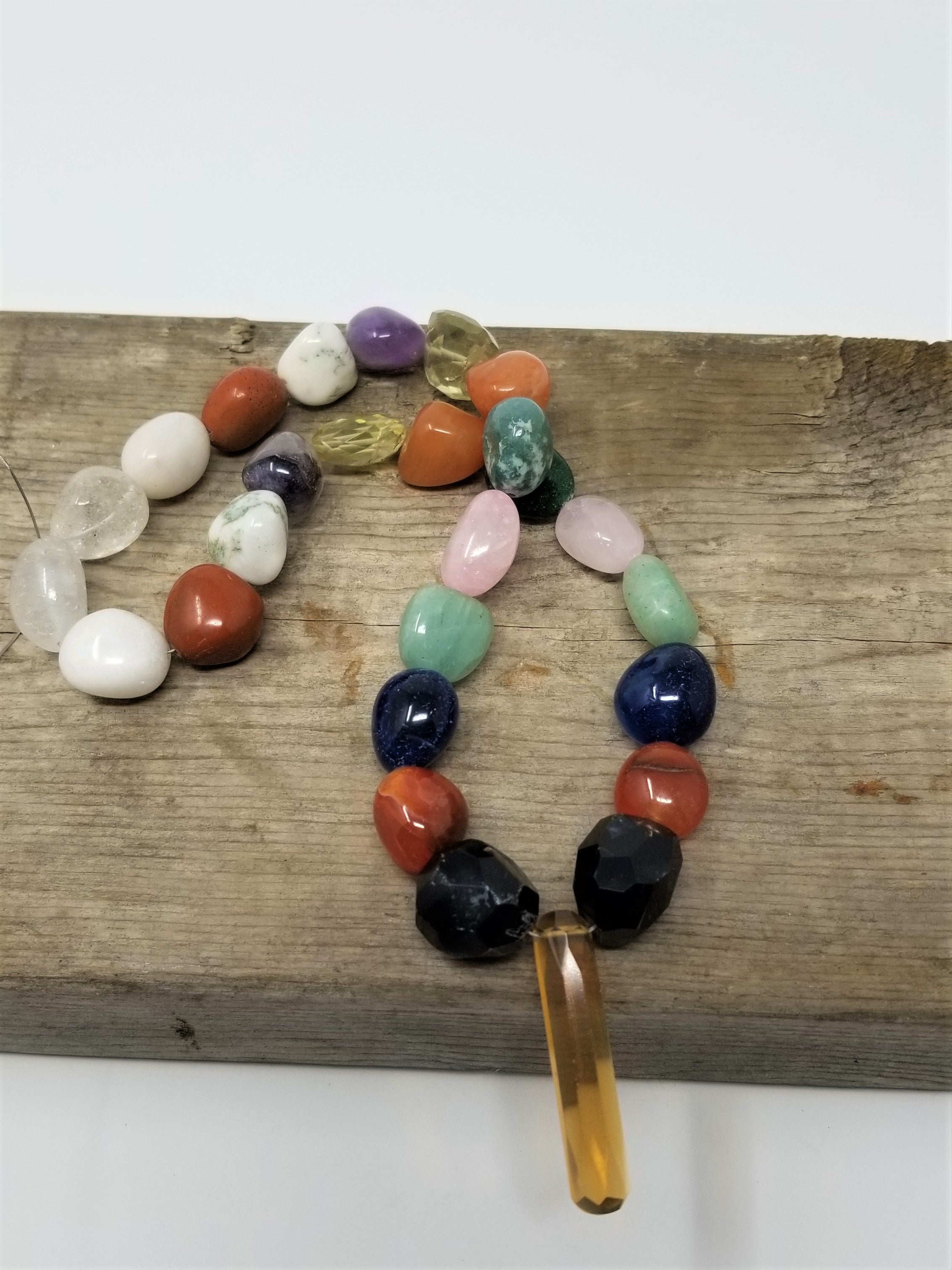 Wonderful Matched Tumble Stone Beads with a Point 27 beads
