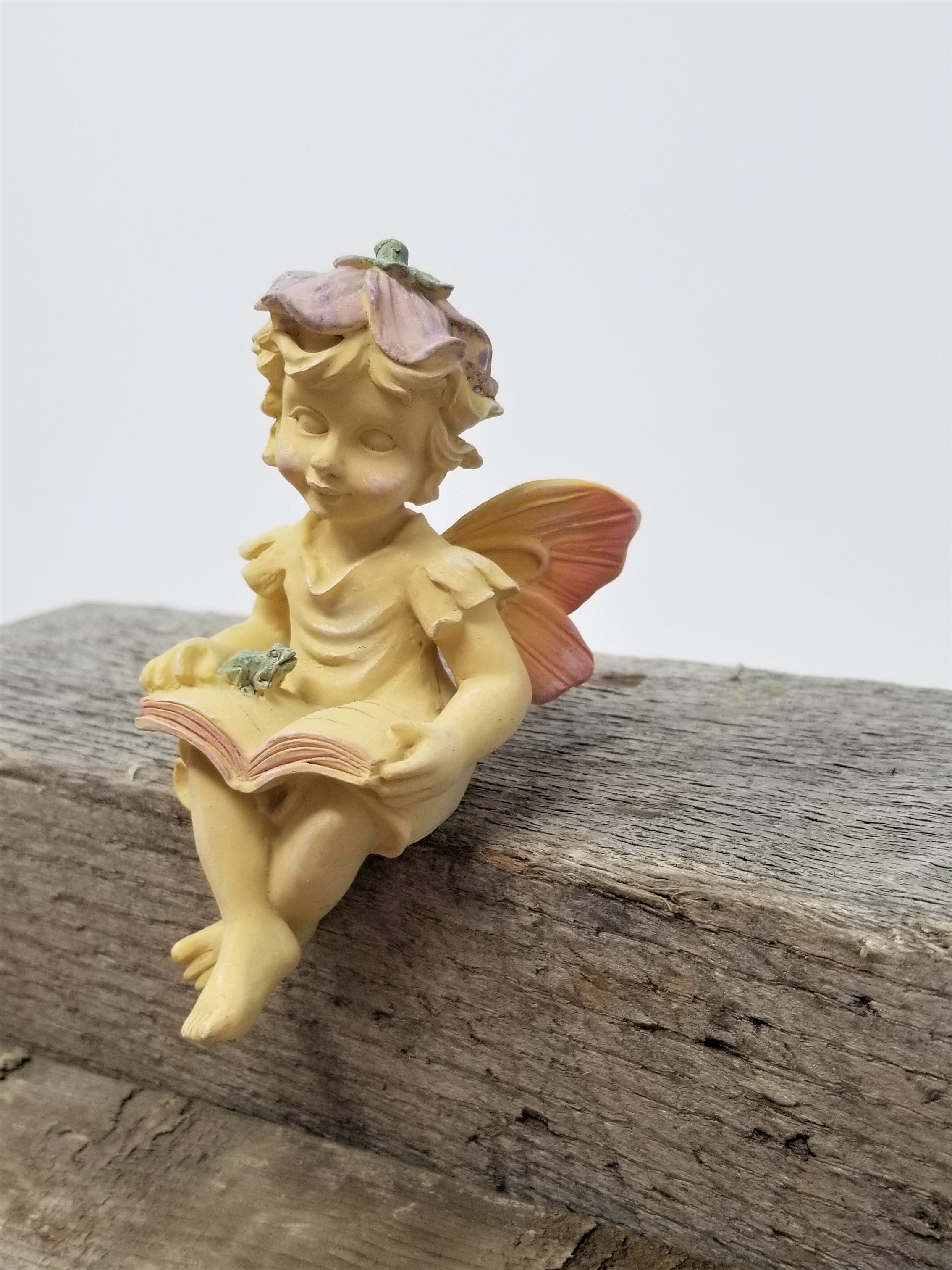 Cute Little Fairy Figurine Reading a Book