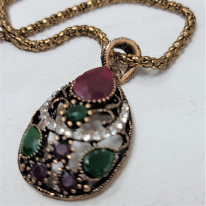 Elegant Goldtone Pendant Necklace Faceted Red & Green
